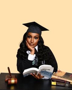 a woman wearing a graduation cap and gown sitting at a desk with books in front of her