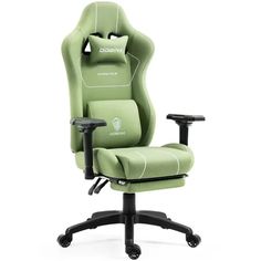 a green office chair sitting on top of a black base