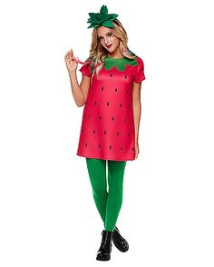 a woman wearing a costume made to look like a watermelon with green leggings