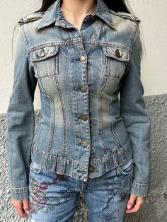 This 2000's denim jacket by iconic Miss Sixty is a stable in everyone's wardrobe. The fit is slim and the color a beige dusty light blue and green denim wash. Condition: this jacket is in a great pre owned condition with no remarks. Size: S Material: 100% cotton Important Information: All orders are shipped within 2-8 business days of purchase with Tracking. A notification email will be sent with tracking when the order has shipped. Once an item has been shipped, Juno Juno is not responsible for Y2k Denim Jacket With Pockets, 90s Style Washed Denim Jacket For Spring, 90s Style Spring Denim Jacket With Button Closure, 90s Style Denim Jacket With Button Closure For Spring, Fitted Washed Denim Jacket, 90s Style Denim Jacket For Spring, Fitted Washed Denim Blue Denim Jacket, Fitted Long Sleeve Faded Denim Jacket, Trendy Fitted Acid Wash Denim Jacket