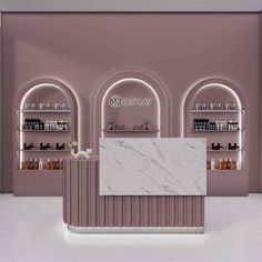 the interior of a store with pink walls and marble counter tops