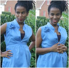 the woman is wearing a blue dress and has her hands on her hips while standing in front of bushes