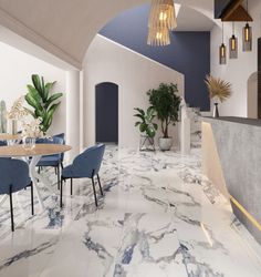 the interior of a modern restaurant with marble flooring and blue chairs, potted plants