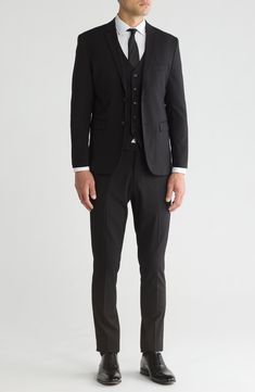 Stretch construction and a skinny cut mean modern appeal from a head-turning three-piece suit. Jacket has notched lapels; chest welt pocket; front welt pockets Vest has front button closure; V-neck Pants have zip fly with button closure; front slant pockets; back button-welt pockets Jacket and vest are lined; trousers are lined to the knee 62% polyester, 35% viscose, 3% spandex Dry clean Imported Each suit has a 6” drop, meaning that a size 38R jacket is paired with size 32 pants Fitted Tuxedo With Hidden Button Closure For Work, Slim Fit Single Button Suit For Workwear, Slim Fit Single Button Suits For Work, Fitted Tuxedo Outerwear With Welt Pockets, Fitted Notched Suit For Workwear, Tailored Three-piece Suit With Lapel Collar For Work, Three-piece Suit With Welt Pockets For Office, Business Suits With Fitted Notched Lapel, Fitted Business Suits With Notched Lapels