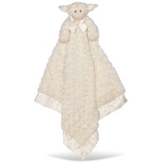 a white teddy bear wrapped in a blanket