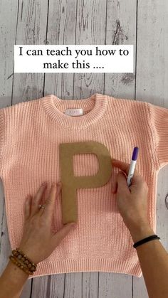 someone is making a t - shirt with the letter p on it, and writing