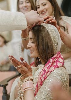 the bride and groom are getting ready for their wedding ceremony