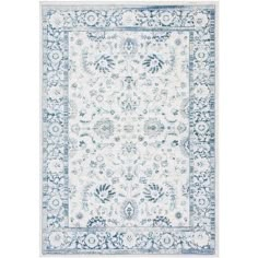 a blue and white rug with an ornate design on the bottom, in front of a white background