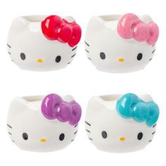 four hello kitty bowls with bows on them