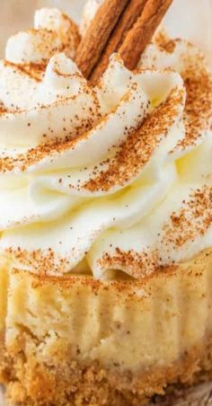 a dessert with whipped cream and cinnamon on top