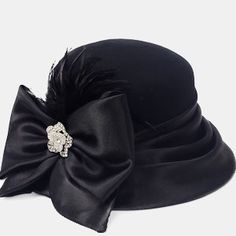 Elevate Your Winter Style: Stay cozy and chic with our felt wool cloche hat, adorned with luxurious satin, feather, and rhinestone details. Warmth Meets Elegance: Crafted from high-quality felt wool, this hat keeps you snug while adding a touch of sophistication to any outfit. Unique Accents: Satin ribbon, delicate feathers, and sparkling rhinestone embellishments create a one-of-a-kind statement piece. Versatile Charm: Perfect for winter outings, holiday parties, or adding a flair of vintage-in Wool Cloche Hat, Felt Wool, Rhinestone Embellishments, Cloche Hat, Hat For Women, Cozy Fits, Timeless Accessories, Vintage Glamour, Wool Hat