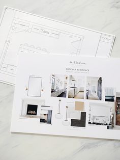 the interior design book is open on top of it's white pages, which are filled with photos and architectural drawings