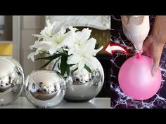 the vases are filled with flowers and shiny balls