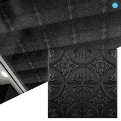 the ceiling is covered in black tint and has an intricate design on it's surface