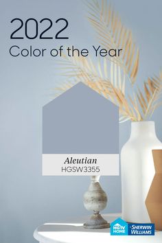 the color of the year is blue, and there are two vases next to it