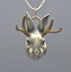 Celebrate your connection to nature and your spirit animal with this silver jackalope pendant with onyx eyes. All items are hand-made, and as such there could be slight variations from the images shown. Wax Casting Jewelry, Lost Wax Casting Jewelry, Onyx Eyes, Your Spirit Animal, Animal Head, Connection To Nature, Head Jewelry, Casting Jewelry, Wax Casting