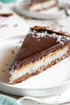 a piece of chocolate and white cake on a plate