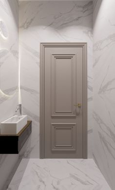 a bathroom with marble walls and flooring