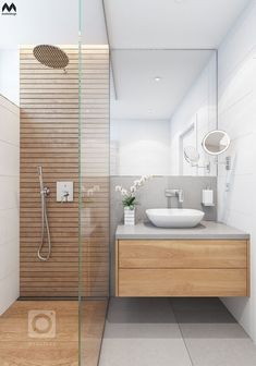 a bathroom with a sink, shower and wooden cabinet in the corner on the floor