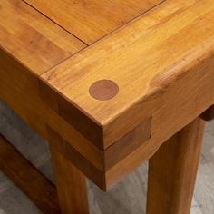 a close up view of the top of a wooden table