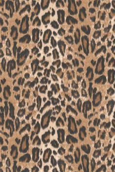 an animal print fabric with brown and black spots