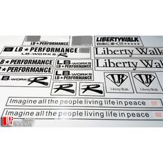 several stickers on the side of a white table with black and red lettering that says liberty walk, imagine all the people living life in peace