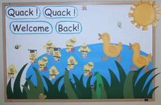 a bulletin board with ducks on it and welcome back written in large letters above them