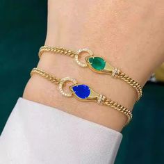 Style: Exotic Trendy Blue Formal Jewelry, Elegant Blue Metal Chain Bracelet, Blue Metal Bracelet Jewelry, Blue Metal Jewelry With Bracelet Strap, Blue Metal Bracelet With Strap, Blue Metal Bracelet With Strap Detail, Adjustable Blue Chain Bracelet For Party, Trendy Blue Bangle Jewelry, Royal Blue Bracelet