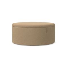 the round ottoman is made out of fabric