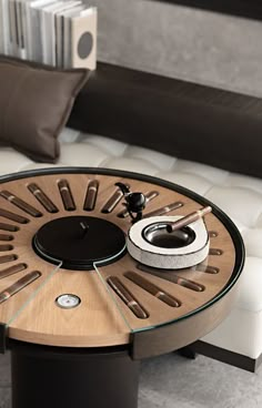 a coffee table that has a clock on it