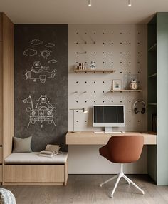 a home office with chalkboard on the wall