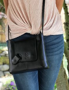 This crossbody bag is on the smaller size (9.5 x 7.5 inches) - perfect when you're on the go. The quality in the leather and stitching is excellent! A beautiful purse made in Florence Italy with a unique design. The bag is light and items are kept secure with the zip closure coupled with the flap. Small zip wall pockets inside and out, plus adjustable strap. #italianleathercrossbodybag #leathercrossbodypurse #italianleatherhandbags #italianleatherhandbagsforwomen #italianleatherbags #verapelle Casual Leather Flap Bag For On-the-go, Elegant Flap Shoulder Bag For On-the-go, Trendy Leather Flap Bag For Travel, Casual Leather Flap Bag, Leather Flap Bag With Magnetic Closure For On-the-go, Chic Flap Bag With Cell Phone Pocket For Travel, Chic Travel Flap Bag With Cell Phone Pocket, Chic Flap Bag With Cell Phone Pocket, Versatile Soft Leather Flap Bag For Travel