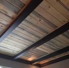 the ceiling is made out of wood planks