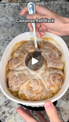 someone is spooning cinnamon roll hack into a casserole dish with the words cinnamon roll hack above it