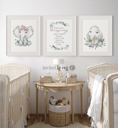 a baby's nursery with three prints on the wall and a table in front of it