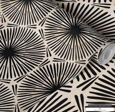 black and white wallpaper with an abstract design