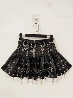 🌟 Embrace Gothic Elegance: Gothic Skull Short Skirt 👗 Unleash Your Dark Side: Step into the realm of gothic fashion with the Gothic Skull Short Skirt, meticulously crafted for those who seek to embrace their inner darkness with sophistication. This skirt is a must-have for anyone looking to add a touch of dark allure to their wardrobe. ✨ Superior Comfort and Striking Design: Crafted from high-quality fabric, this short skirt offers exceptional comfort and style. The striking skull motifs add a Gothic Skirt Bottoms For Party, Punk Party Skirt With Lining, Punk Style Party Skirt With Lining, Black Gothic Mini Skirt For Alternative Fashion, Black Gothic Mini Skirt For Cosplay, Gothic Mini Skirt For Alternative Fashion, Punk Party Skirt With Ruffles, Black Punk Mini Skirt For Festival, Punk Style Black Mini Skirt For Festival