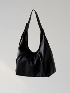 Editor's NotesEasy and practical bag designed by Ecrit will add an accent on your outfit- Sizable bag that can carry everything- Made from soft vegan leather- Top zipper fastening- Accented with wrinkle detail- Adjustable strapMeasurements(in.)- W x H x D: 17.3 in. x 16.1 in. x 5.1 in.- Strap height 11.8 in. - 22.0 in.- Weight 300gComposition & Care- Outshell: Vegan leather (Polyurethane)- Lining: Polyester- Do not washDesigner- by Ecrit Chic Shoulder Bag With Zipper Closure For Everyday Use, Versatile Everyday Shoulder Bag With Zipper, Versatile Soft Leather Baguette Bag For Errands, Versatile Everyday Soft Leather Shoulder Bag, Chic Daily Hobo Bag With Large Capacity, Chic Everyday Large Capacity Hobo Bag, Versatile Daily Soft Leather Shoulder Bag, Practical Bag, Wardrobe Outfits