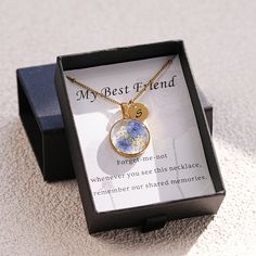 a necklace in a gift box with the message, my best friend is forever and not whenever you see this necklace, remember our shared memories