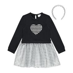 This adorable toddler girls' dress from Btween features a trendy black and white houndstooth pattern on a heart-shaped applique at the front and a matching skirt. It's made from a knit fabric and has round neckline, long cuffed sleeves, a button closure, and hits at knee-length. It also includes a matching headband to complete the look.# Pieces In Set: 2Included: 1 Headband(s), 1 Dress(es)Closure Type: ButtonNeckline: Round NeckSleeve Length: Long SleeveSleeve Style: Cuffed SleeveDress Length: K 4t Dress, Dress Sets, Cuffed Sleeve, White Houndstooth, Matching Headband, Houndstooth Pattern, Dresses Kids Girl, Dress Set, Girls Long Sleeve