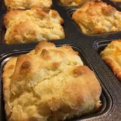 freshly baked biscuits in a muffin tin ready to be eaten for breakfast or dessert