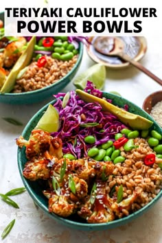 two bowls filled with rice, meat and veggies on top of a table