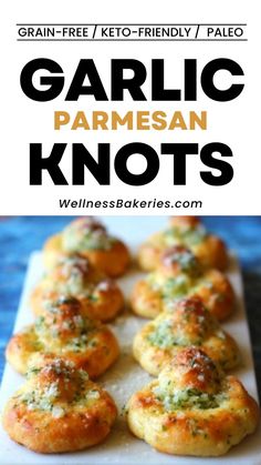 garlic parmesan knots on a baking sheet with text overlay that reads garlic parmesan knots