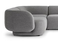 the corner sofa is made out of grey fabric