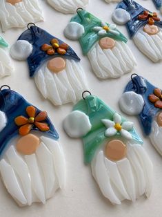 a table topped with lots of ceramic ornaments