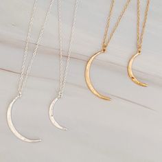 Make a stylish statement with this Crescent Duo Necklace Set Of 2. Featuring two different sizes of beautiful crescent pendants, this set allows for stylish layering. Perfect for any occasion, you can pick one or both for versatile styling options. Create an eye-catching look with this fashionable piece. Each chain is 16 inch and has a 3 inch extender. Alloy metal Lead and Nickel compliance Designed in USA and crafted in China Duo Necklace, Celestial Necklace, Hair Setting, Star Charms, Scrunchie Hairstyles, Perfect Gift For Her, Steel Jewelry, Stainless Steel Jewelry, Hair Accessories Headbands