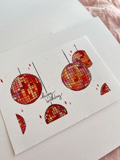 two cards with red and orange designs on them, one is for someone's birthday