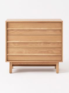 a wooden dresser with three drawers on one side and an open drawer on the other