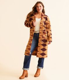 Hooey Aztec Duster Cardigan - Orange Large, Women's Maroonbrown Printed rib knit flyaway cardigan Body length 40 on size small. Layering piece(s) and/or accessories sold separately.. 100% Polyester. Machine wash cold with like colors. Do not bleach. Tumble dry low. Cool iron as needed. Do not iron print and accessories. Do not dry clean. Apparel & Accessories > Clothing > Shirts & Tops Brown Long Sleeve Cardigan For Cold Weather, Brown Cardigan For Cold Weather In Fall, Brown Cardigan For Fall And Cold Weather, Fitted Brown Knit Outerwear, Brown Open Front Sweater Coat For Layering, Fitted Brown Sweater Coat For Fall, Fitted Brown Cardigan For Fall, Cozy Brown Sweater Coat For Fall, Fitted Brown Cardigan For Cold Weather