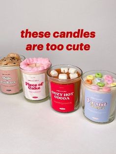 there are four different types of candles in the same cup and one is filled with marshmallows